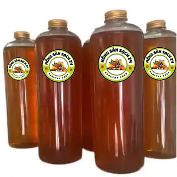 Mật ong hoa cà phê nguyên chất chai 1 lít tại Nông sản sạch 24 Mật ong hoa cà phê nguyên chất chai 1 lít tại Nông sản sạch 24